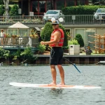 genteman riding kayak at High Peaks Resort - Lake Placid
