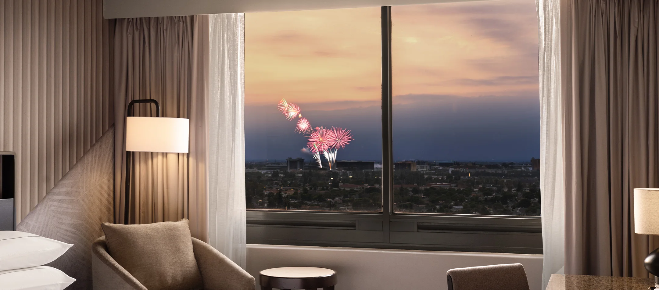 hotel room with fireworks in window