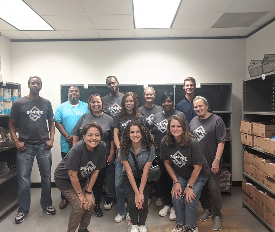 SPIRE Home Office teams recently visited Irving Cares and helped stock the shelves