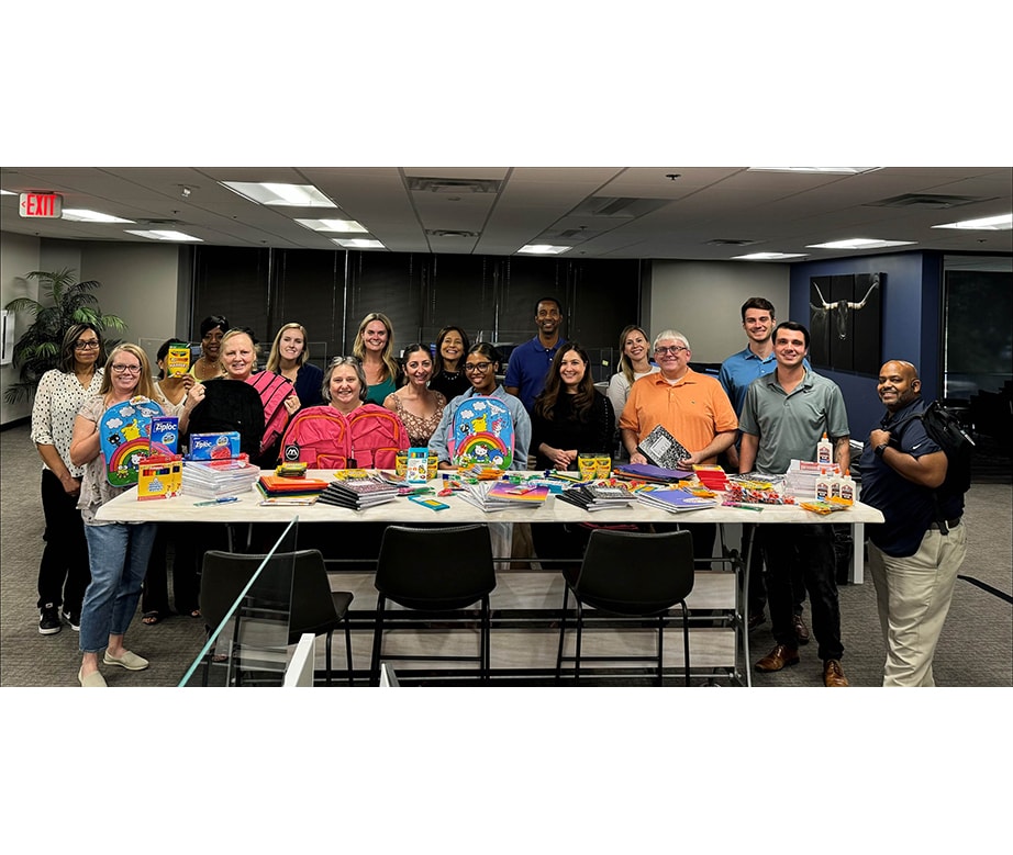 Spire Hospitality team helping pack school supplies