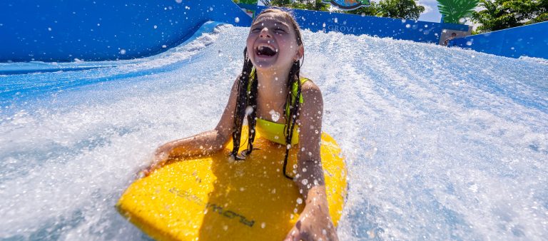 kid swimming at waterpark