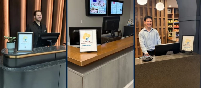 Three hotel front desks with Autism Double-Checked certification signs